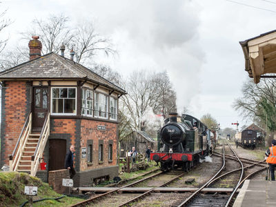 The Ivatt steams past the signal box