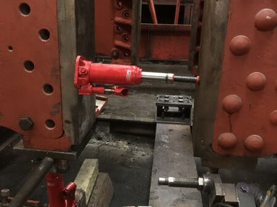 Jacks are used to make sure that the horn blocks are firmly pushed against the cut out in the frames before the holes are reamed and fitted bolts machined and driven in.