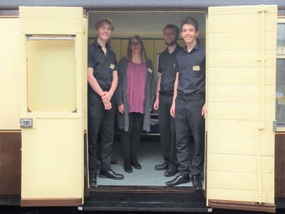 Fred, Anne,Michael and Tom open up the new kitchen carriage
